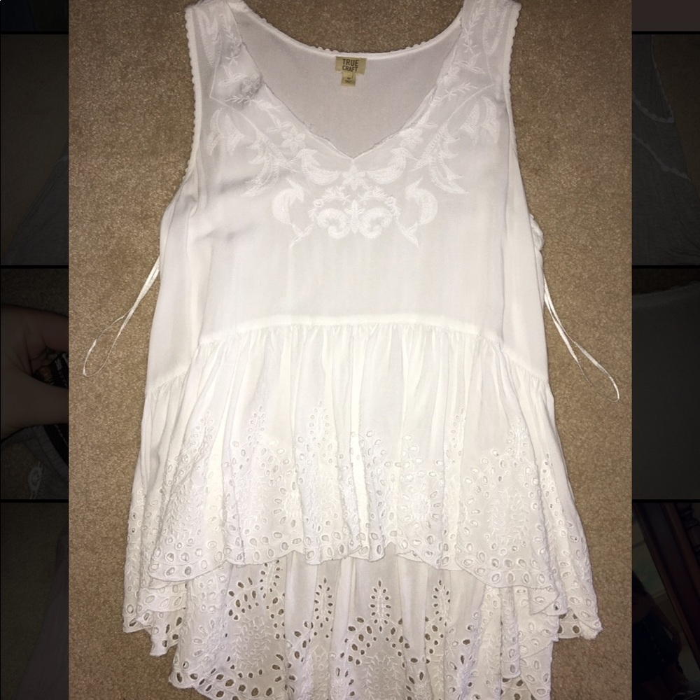 White ruffled high-cut top